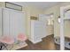 Bedroom with two pink chairs and dresser at 125 Trickle Dr, Summerville, SC 29483
