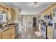 Open concept kitchen with stainless steel appliances and an adjacent dining area at 125 Trickle Dr, Summerville, SC 29483