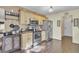 Kitchen boasts stainless steel appliances, light wood cabinets, and a wood countertop at 125 Trickle Dr, Summerville, SC 29483