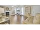 Living room featuring hardwood floors, fireplace, and built-in shelving at 125 Trickle Dr, Summerville, SC 29483