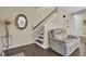 Living room with a recliner, hardwood floors, and an elegant mirror at 125 Trickle Dr, Summerville, SC 29483
