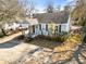 Cute gray house with yard and driveway at 1343 E Montague Ave, North Charleston, SC 29405