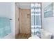 Clean bathroom with updated shower and vanity at 1343 E Montague Ave, North Charleston, SC 29405