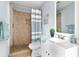 Clean bathroom with updated shower and vanity at 1343 E Montague Ave, North Charleston, SC 29405