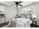 Bright bedroom with ceiling fan and hardwood floors at 1343 E Montague Ave, North Charleston, SC 29405