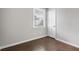 Bright bedroom with wood floors and window at 1343 E Montague Ave, North Charleston, SC 29405