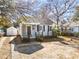 Gray house with driveway and detached shed at 1343 E Montague Ave, North Charleston, SC 29405