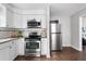 Updated kitchen with stainless steel appliances and granite countertops at 1343 E Montague Ave, North Charleston, SC 29405