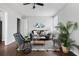Cozy living room with dark hardwood floors, and a comfy couch at 1343 E Montague Ave, North Charleston, SC 29405
