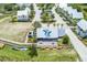 Aerial view showcases a community with waterfront access, kayak storage, and organized parking at 1474 Mizzen Aly, Johns Island, SC 29455