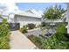Landscaped backyard with a patio, grill, and plenty of space for outdoor activities at 1474 Mizzen Aly, Johns Island, SC 29455