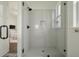 Bathroom features a glass enclosed shower with white subway tile and black fixtures at 1474 Mizzen Aly, Johns Island, SC 29455