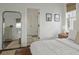 Bright bedroom with a large mirror, white walls, and stylish decor at 1474 Mizzen Aly, Johns Island, SC 29455