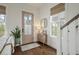 Stylish entryway with a decorative door, hardwood floors, and a charming mirror at 1474 Mizzen Aly, Johns Island, SC 29455
