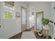 Hallway with wood floors, decor, and entry to living spaces at 1474 Mizzen Aly, Johns Island, SC 29455