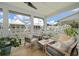 Covered patio with comfortable seating and views of the surrounding neighborhood at 1474 Mizzen Aly, Johns Island, SC 29455