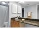 Bathroom features granite countertop and a large mirror at 1625 Live Oak Park, Seabrook Island, SC 29455