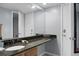 Bathroom with granite countertop and a large mirror at 1625 Live Oak Park, Seabrook Island, SC 29455