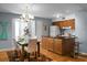 Kitchen with wood cabinets, granite countertop, and breakfast bar at 1625 Live Oak Park, Seabrook Island, SC 29455
