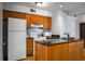 Cozy kitchen with wood cabinets, granite counters and modern appliances at 1625 Live Oak Park, Seabrook Island, SC 29455