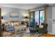 Living room with sliding glass doors to a patio and comfortable seating area at 1625 Live Oak Park, Seabrook Island, SC 29455