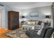 Living room with hardwood floors, couch, chairs, and decorative rug at 1625 Live Oak Park, Seabrook Island, SC 29455