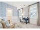 Cozy bedroom with blue and white accents and a desk at 1680 Banning St, Mount Pleasant, SC 29466