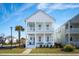 Two-story white house with front porch and landscaping at 1680 Banning St, Mount Pleasant, SC 29466