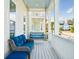 Front porch with seating and a porch swing at 1680 Banning St, Mount Pleasant, SC 29466