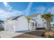White detached garage with a concrete driveway at 1680 Banning St, Mount Pleasant, SC 29466