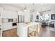 Open concept kitchen with island, stainless steel appliances, and white cabinets at 1680 Banning St, Mount Pleasant, SC 29466