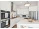 Modern kitchen featuring stainless steel appliances and white cabinetry at 1680 Banning St, Mount Pleasant, SC 29466