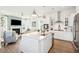 Modern white kitchen with island and stainless steel appliances at 1680 Banning St, Mount Pleasant, SC 29466