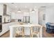 Bright kitchen with white cabinets, stainless steel appliances, and a large island at 1680 Banning St, Mount Pleasant, SC 29466