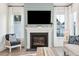 Relaxing living room featuring a fireplace and comfortable seating at 1680 Banning St, Mount Pleasant, SC 29466