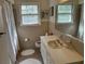 Bathroom with beige tile and built-in vanity at 19 Fort Royal Ave, Charleston, SC 29407