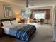 Bright bedroom with a large bed, window seating, and closet at 19 Fort Royal Ave, Charleston, SC 29407