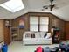 Spacious bonus room with skylights and a couch at 19 Fort Royal Ave, Charleston, SC 29407