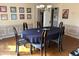 Bright dining room with an oval table and hardwood floors at 19 Fort Royal Ave, Charleston, SC 29407