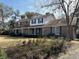 Brick house with a large front yard and mature trees at 19 Fort Royal Ave, Charleston, SC 29407