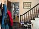 Foyer with stairs, coat rack, and storage area at 19 Fort Royal Ave, Charleston, SC 29407