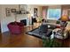 Living room with hardwood floors and a fireplace at 19 Fort Royal Ave, Charleston, SC 29407