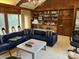 Spacious living room with a fireplace and built-in shelving at 19 Fort Royal Ave, Charleston, SC 29407
