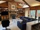 Spacious living room with a fireplace and built-in shelving at 19 Fort Royal Ave, Charleston, SC 29407