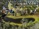 Aerial view of a neighborhood with houses and a pond at 2035 Culloden Dr, Summerville, SC 29483