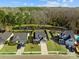 Aerial view of homes and neighborhood with pond at 2035 Culloden Dr, Summerville, SC 29483