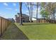 Spacious backyard with a large grassy area and privacy fence at 2035 Culloden Dr, Summerville, SC 29483