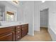 Double vanity bathroom with soaking tub and walk-in closet at 2035 Culloden Dr, Summerville, SC 29483