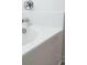 White bathtub with white tile surround at 2035 Culloden Dr, Summerville, SC 29483