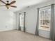 Spacious bedroom with two windows and neutral decor at 2035 Culloden Dr, Summerville, SC 29483